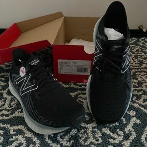 Brand new, with tags a New Balance 1080 v11 running shoes, size 12 Wide.